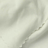 Polyester Stretch Milk Silk Knit Fabric, 180 gsm, 150 cm — White — texture