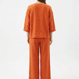Washed Viscose Linen Woven Fabric, 220 gsm — Orange — mockup: dress bodycon