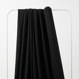 Polyester Stretch Ponte Knit Fabric, 220 gsm, 162 cm — Black — mockup: dress bodycon