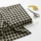 Black Houndstooth Jacquard, Polyester, 260 gsm, 160 cm — mockup: dress bodycon