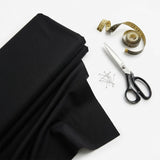 Viscose Nylon Stretch Ponte Knit Fabric, 210 gsm, 160 cm — Black, ref EF-258459 — mockup: dress bodycon