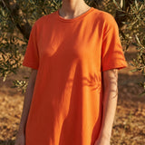 Polyester Stretch Scuba Knit Fabric, 235 gsm, 163 cm — Orange — mockup: scene